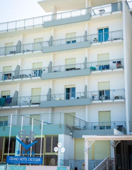 Modern hotel with balconies and pool, located in Jesolo.